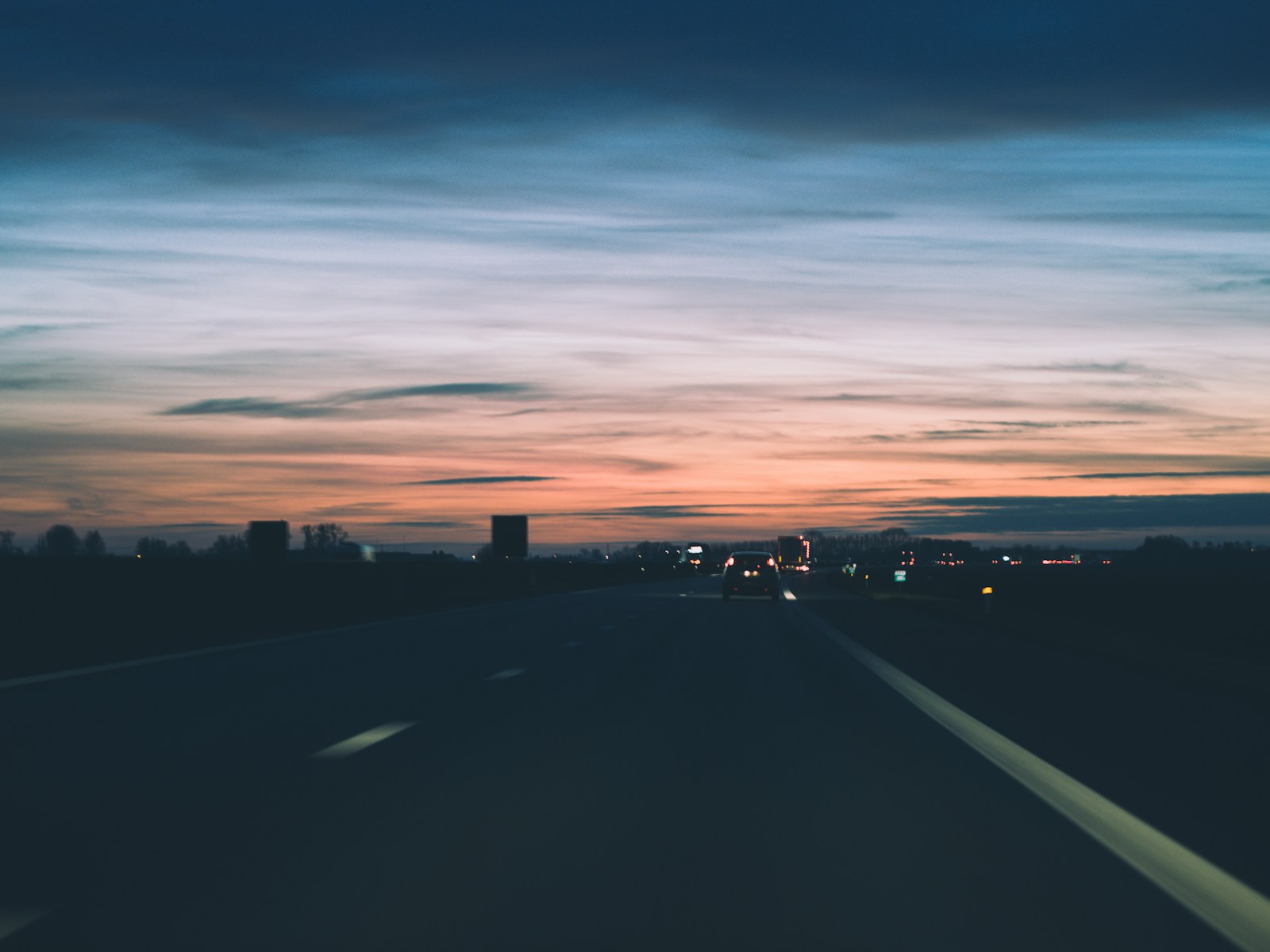 An open road leading towards the horizon, representing clarity and direction during change